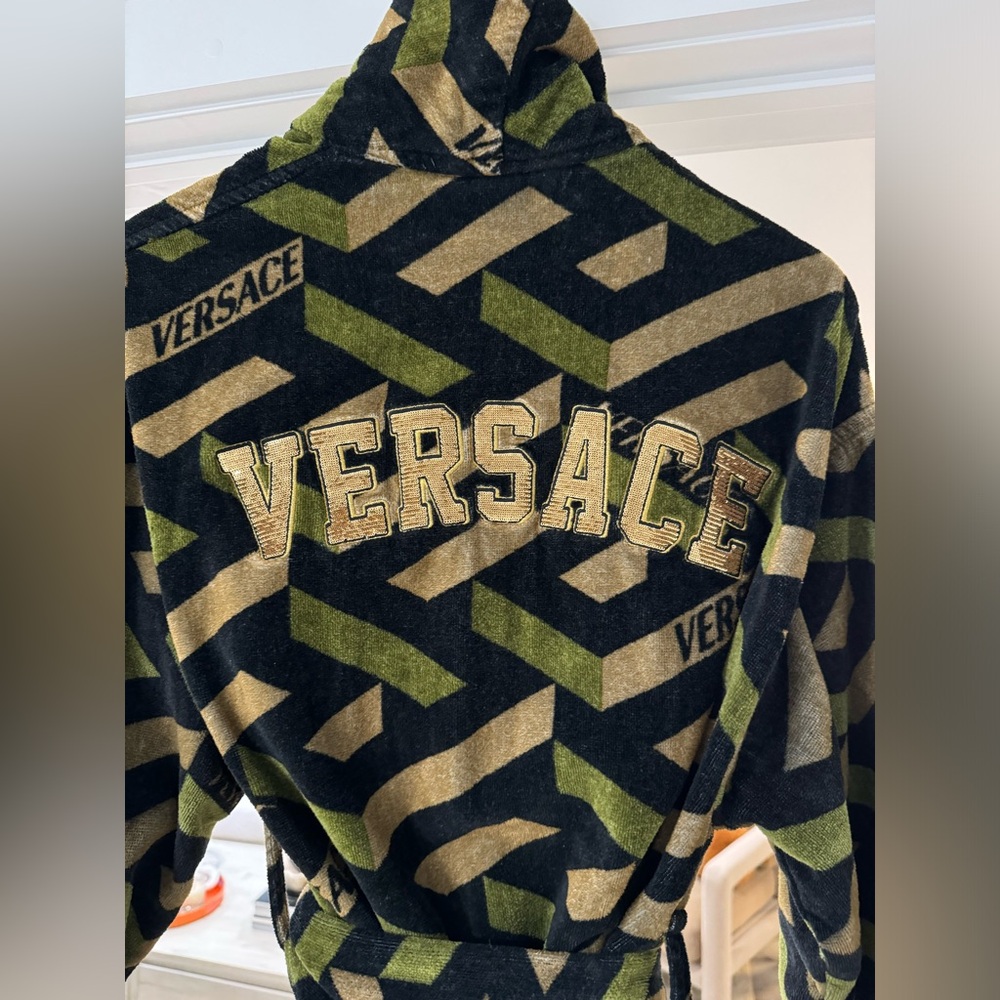 Versace bathrobe made of towel material.